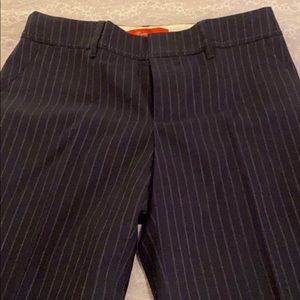 Anthropologie pinstriped navy blue pants/slacks.